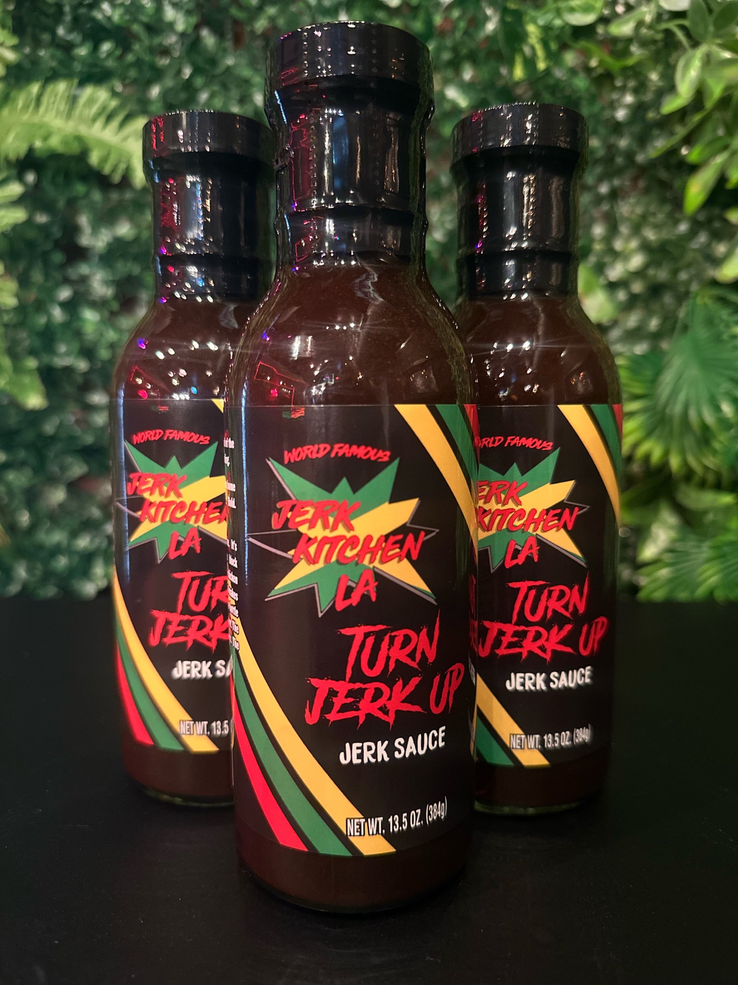 Turn Jerk Up bottles with tropical background